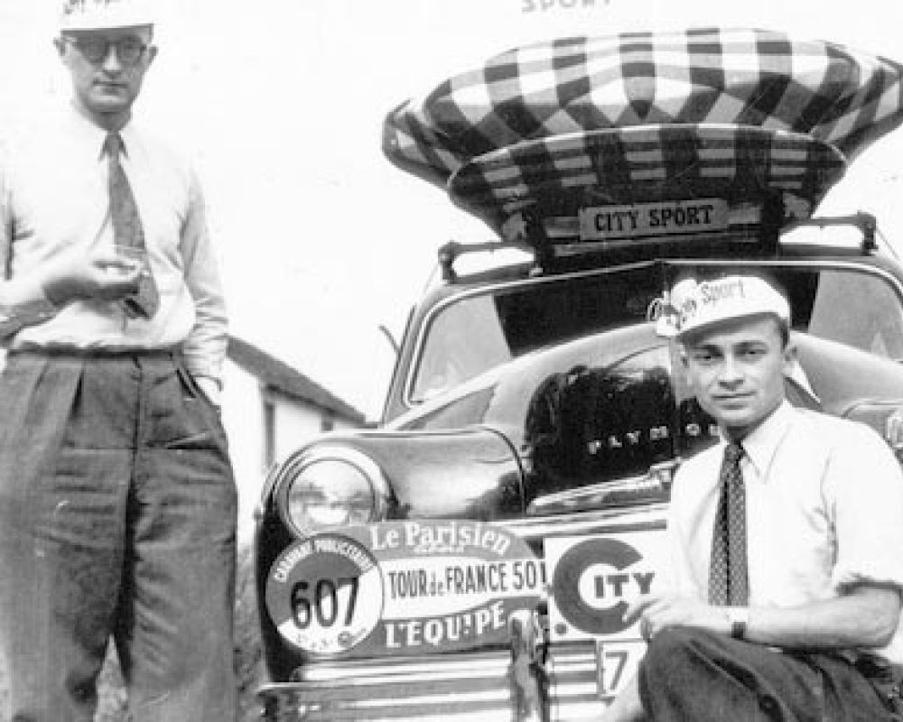 vintage photo of men with City Sport race car and classic caps or hats